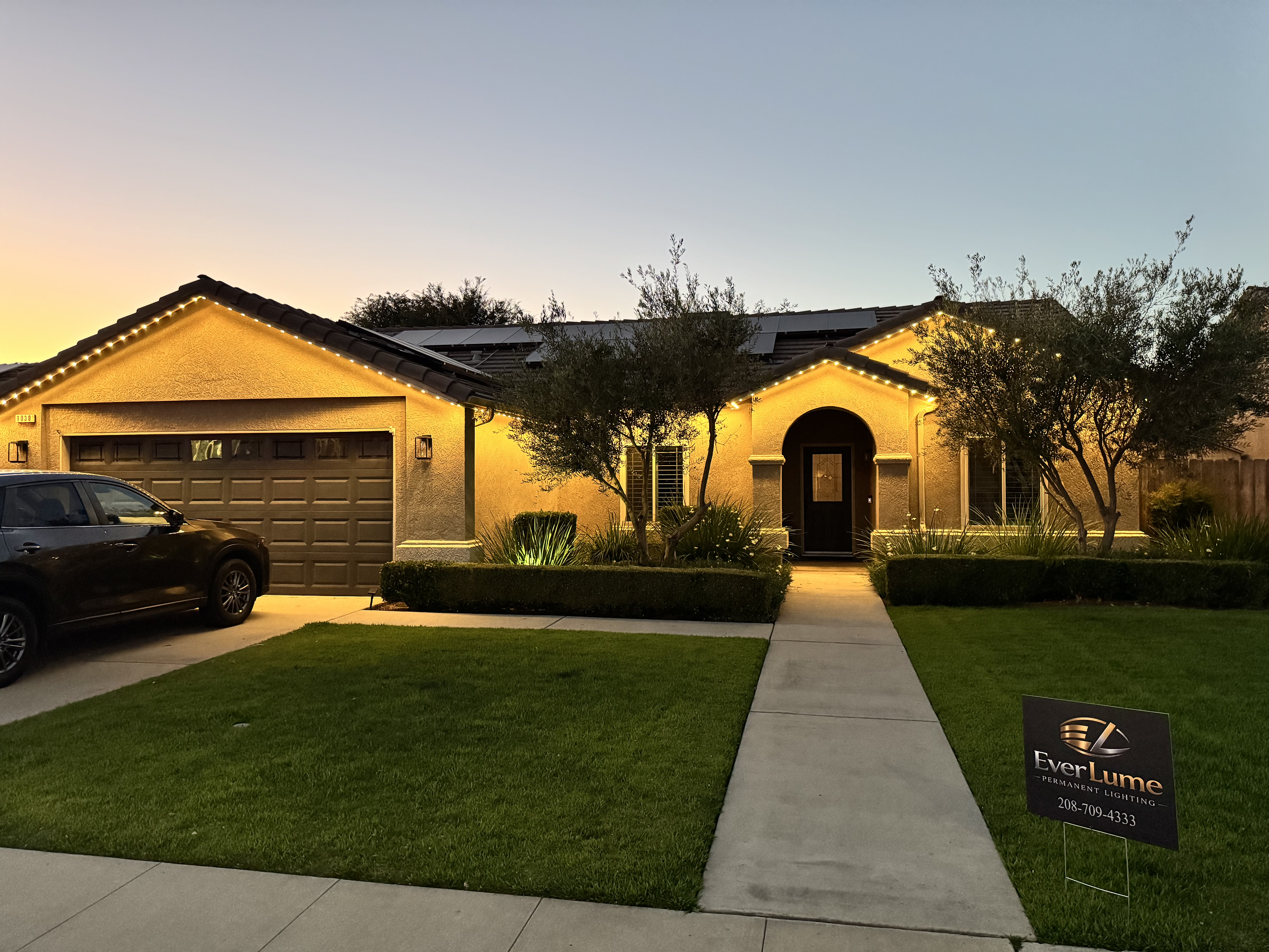 EverLume permanent roofline lighting at golden hour
