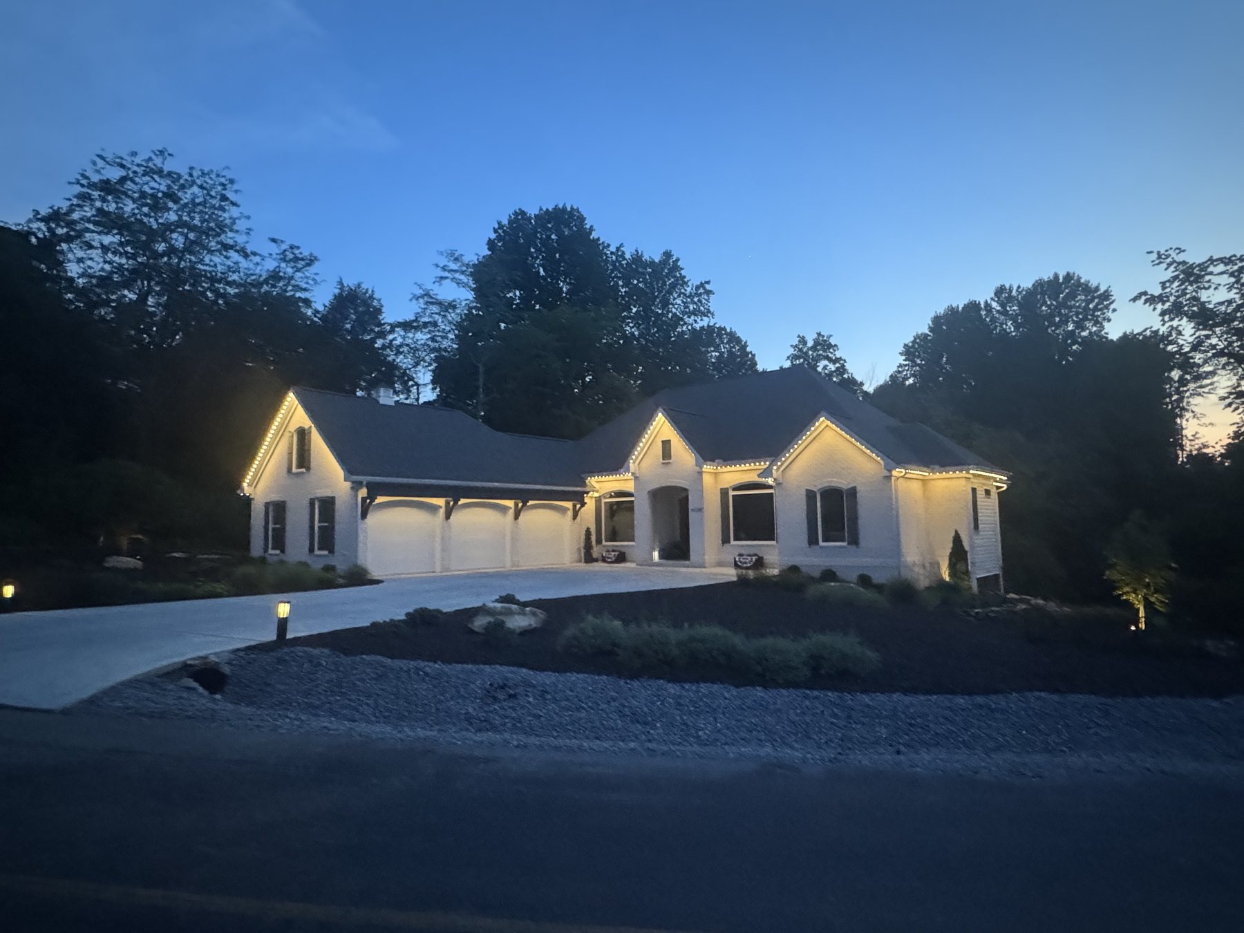 EverLume permanent architectural roofline lighting at dusk